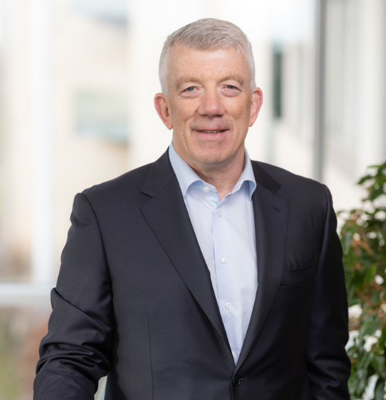 portait of hugh mcguire wearing a suit