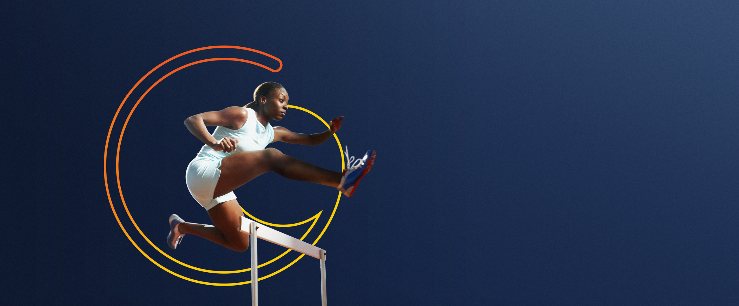girl jumping over hurdle