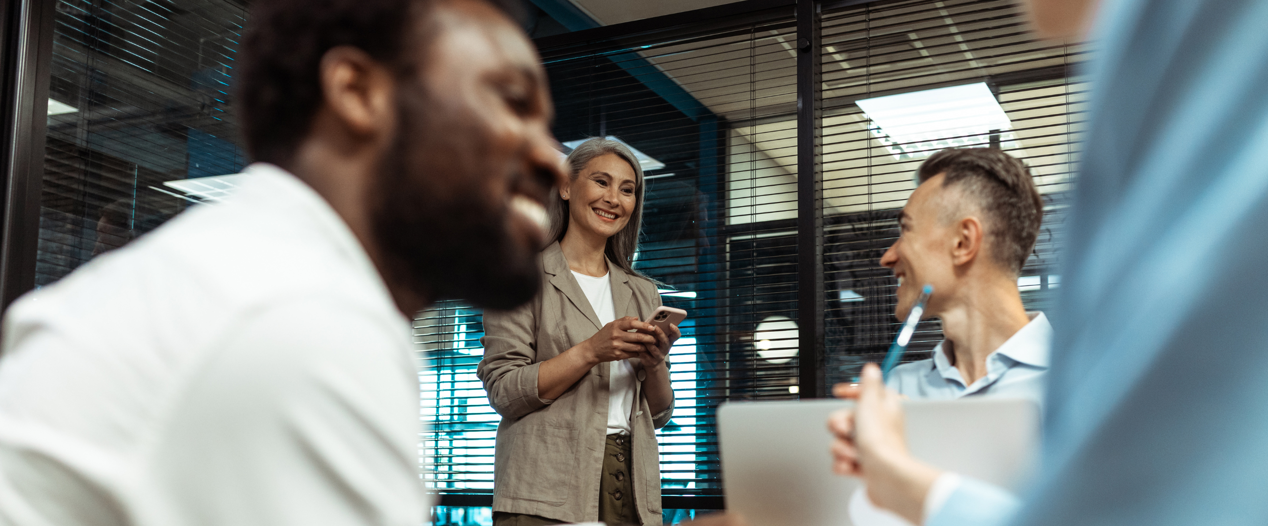 three people in a business meeting