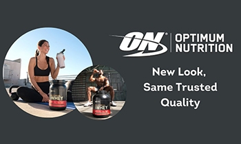 a woman and a man drinking a shake launching the new gold standard whey tub