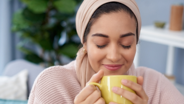girl drinking from a mug