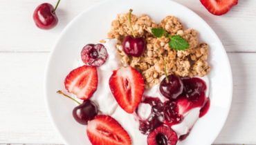 bowl of granola and yogurt with fruit