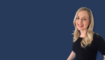 woman in black t-shirt on navy background