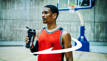 man with shaker on basketball court