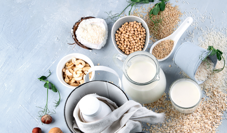 table full of milk, coconut, seeds and nuts