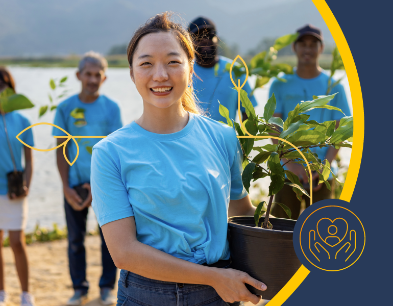 woman holding a plant