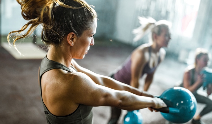 women doing a kettlebell workout
