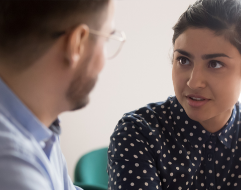 two people discussing