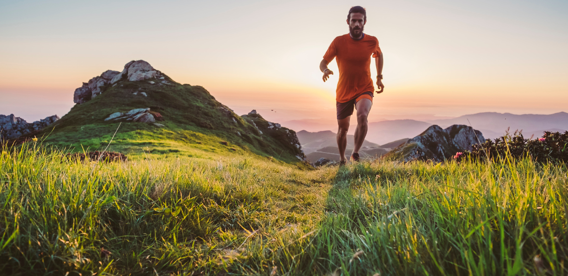 man running on a hill