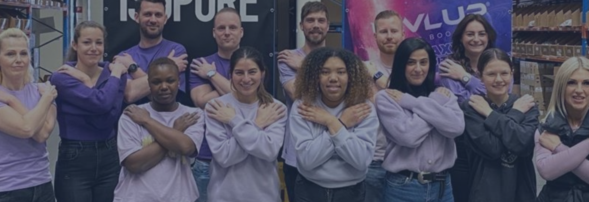 crowd of people crossing their hands