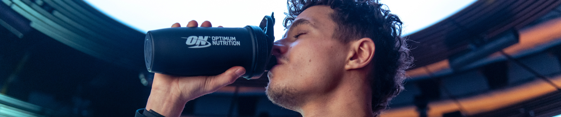 Lando Norris drinking Optimum Nutrition
